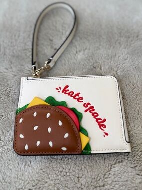 kate spade zip-around wristlet with gold hardware